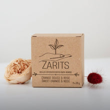 Load image into Gallery viewer, Boîte de bain ZARITS avec illustration de fleur et boule effervescente à côté