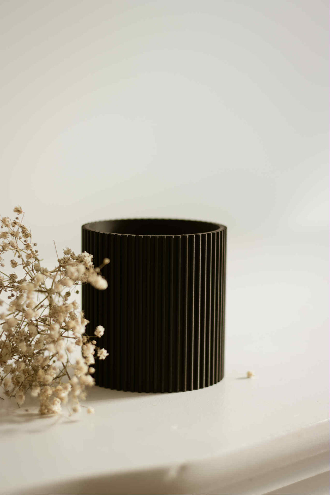 Cache pot ondulé noir